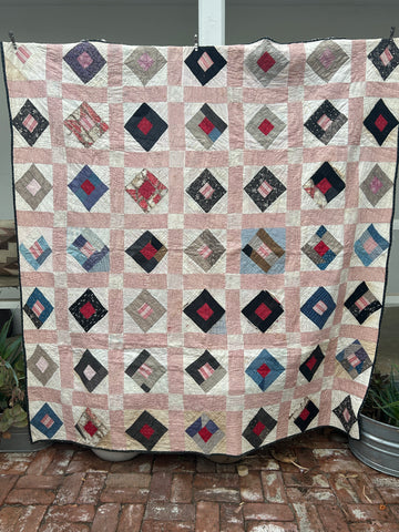 Antique Quilt in a Quilt - Cutter?